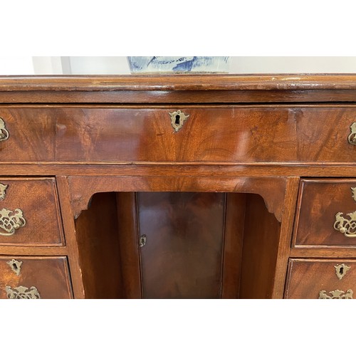 1324 - A George III style mahogany kneehole desk, 80 cm wide