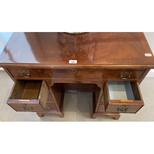 1324 - A George III style mahogany kneehole desk, 80 cm wide