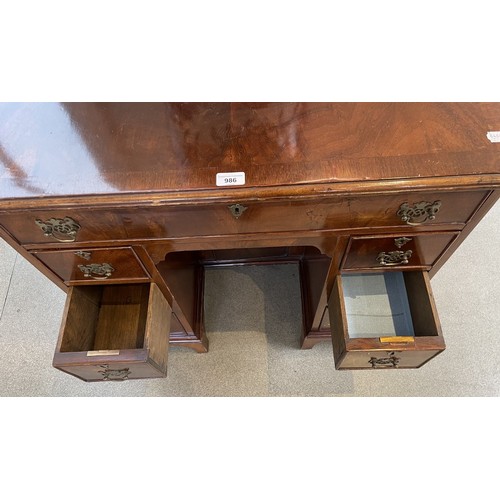 1324 - A George III style mahogany kneehole desk, 80 cm wide