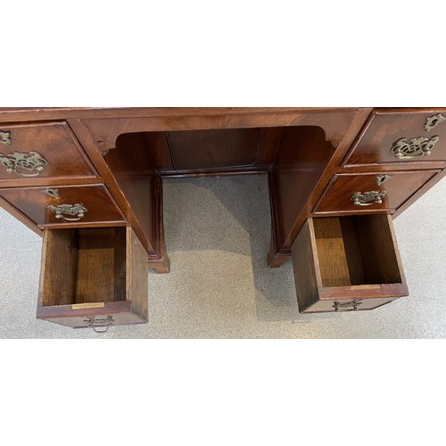 1324 - A George III style mahogany kneehole desk, 80 cm wide
