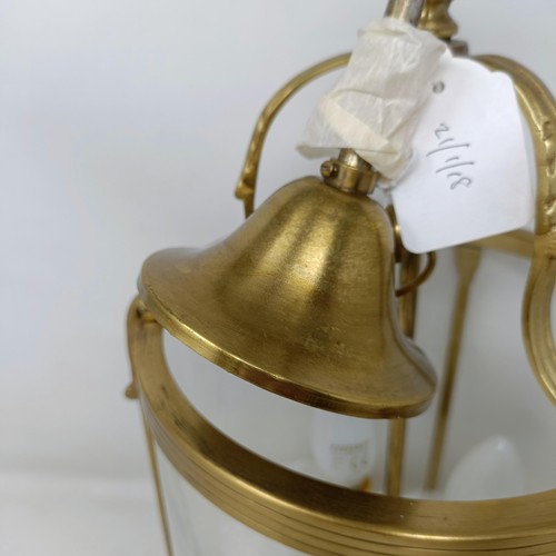 1327 - A brass and glass wall light, 44 cm high