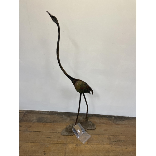 1326 - A metal garden statue of a bird, 116 cm high