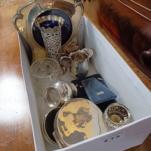 766 - A silver mounted photograph frame, two silver cream jugs and assorted other items