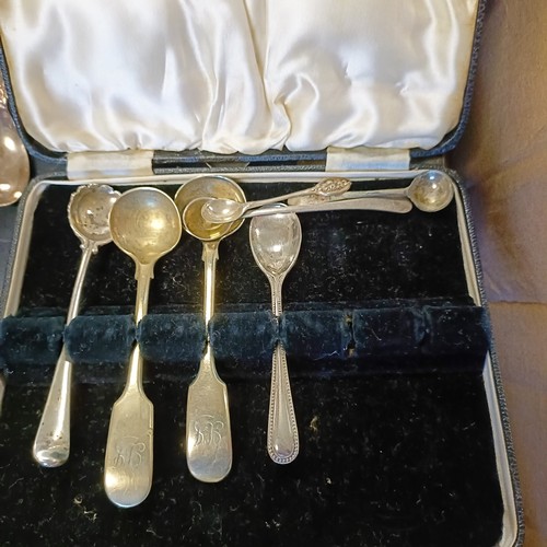 767 - A set of six silver coloured metal and multi coloured enamel coffee spoons, cased, assorted commemor... 
