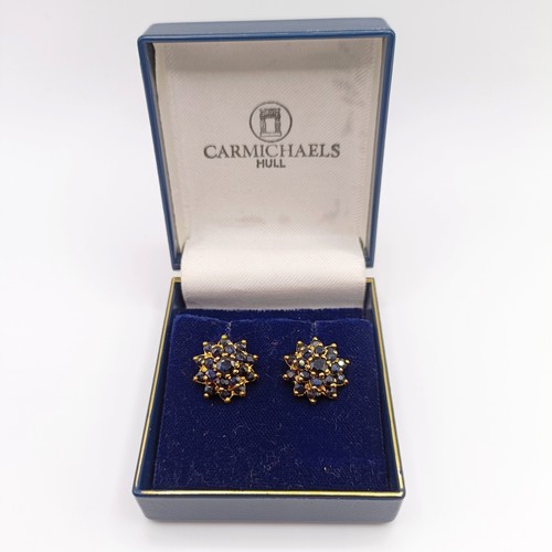742 - A pair of sapphire stud earrings