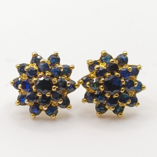 742 - A pair of sapphire stud earrings