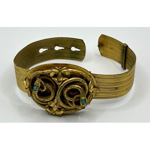 733 - *** Regretfully Withdrawn*** A late 19th century gold plated double snake bracelet