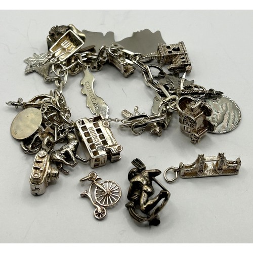 735 - A mid 20th century silver brooch, in the form of a man and a vase, Friedrich Busse, in original box,... 