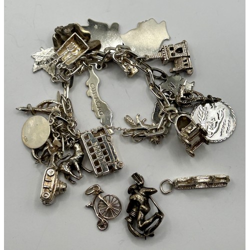 735 - A mid 20th century silver brooch, in the form of a man and a vase, Friedrich Busse, in original box,... 
