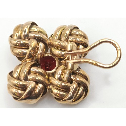 731 - A pair of gold and garnet clip on earrings