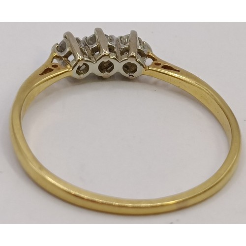 729 - An 18ct gold and diamond three stone ring, ring size P