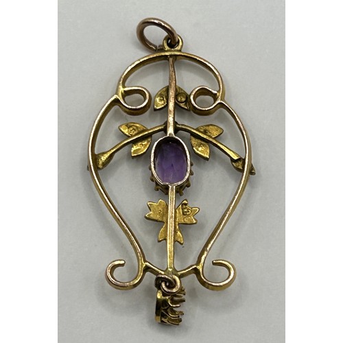 741 - An early 20th century 9ct gold, amethyst and seed pearl pendant, 50 x 25 mm approx.