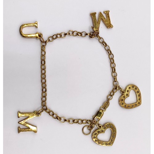 724 - An early 20th century silver memorial brooch, other jewellery, and a silver chain, with yellow metal... 