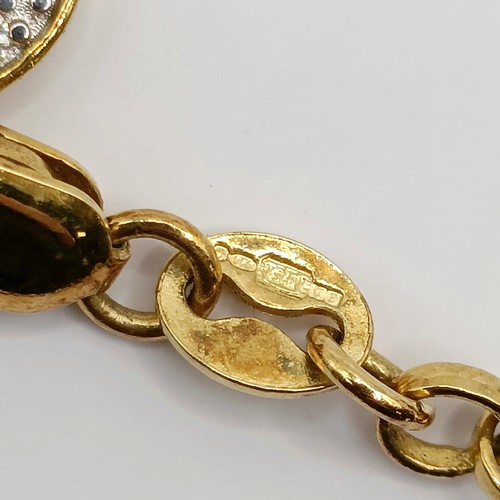 724 - An early 20th century silver memorial brooch, other jewellery, and a silver chain, with yellow metal... 