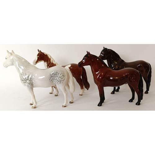 603 - A Beswick Pinto Pony, version 2, a Connemara Pony, an Exmoor Pony and a Dartmoor Pony Warlord (4)