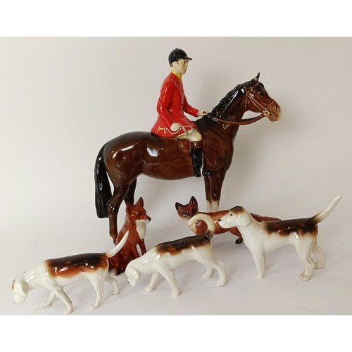 605 - A Beswick Huntsman, five hounds and two foxes (8)