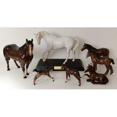607 - A Beswick Horse, 20 cm high, and six others (7)