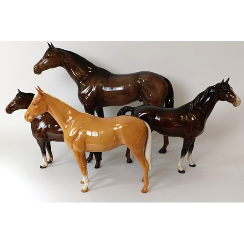 608 - A Beswick Horse, 29 cm high and three others (4)