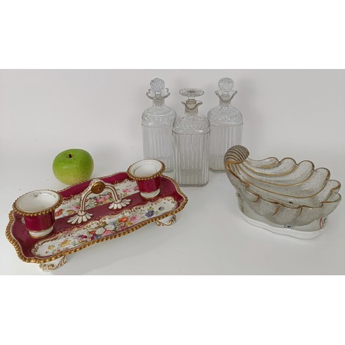 624 - A 19th century porcelain inkstand, decorated flowers, three decanters, a glass shell form bowl and a... 