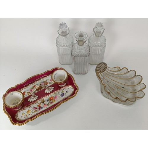 624 - A 19th century porcelain inkstand, decorated flowers, three decanters, a glass shell form bowl and a... 