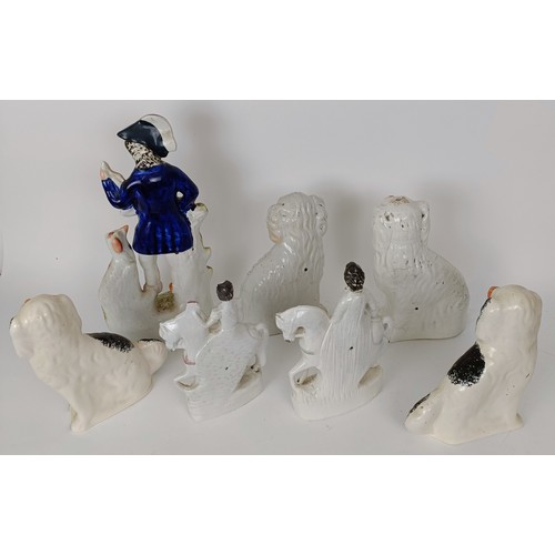 625 - A Staffordshire figure of a hunter, 40 cm high, and six other Staffordshire figures (7)