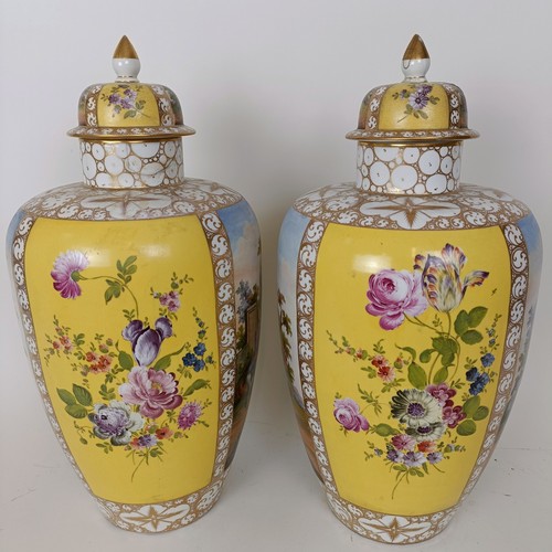 626 - A pair of Vienna style vases and covers, decorated landscapes and flowers, 40 cm high (2)