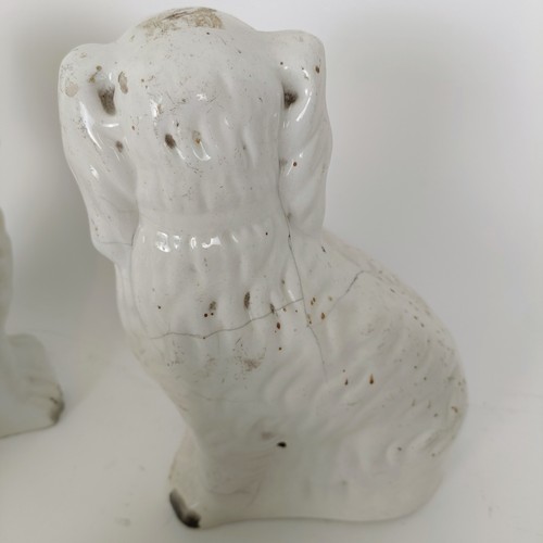 625 - A Staffordshire figure of a hunter, 40 cm high, and six other Staffordshire figures (7)
