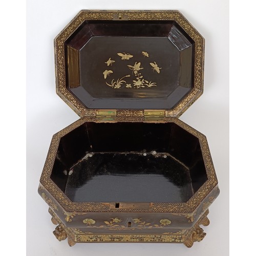 647 - A 19th century lacquered box, decorated in the Chinese manner, 26 cm wide