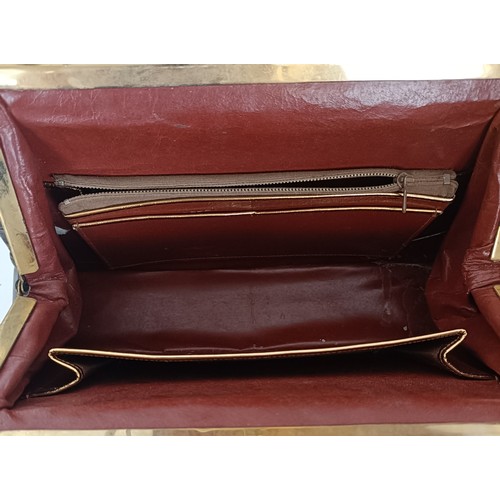 655 - A crocodile skin brief case and similar handbag (2)