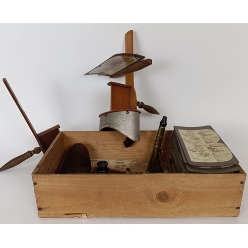 719 - A stereoscopic viewer, another, various cards and a monocular