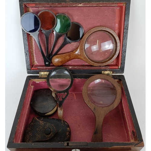 721 - A rosewood box, a lens, in a leather case and assorted other items