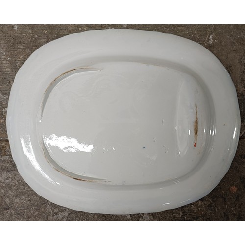 756 - A large Staffordshire blue and white meat plate, 63 x 50 cm and a blue and white meat plate, with a ... 