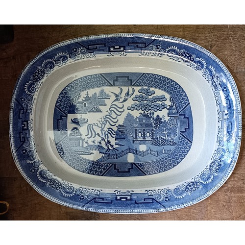 756 - A large Staffordshire blue and white meat plate, 63 x 50 cm and a blue and white meat plate, with a ... 