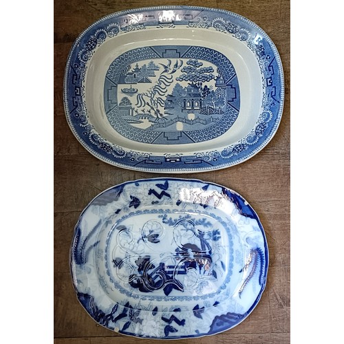 756 - A large Staffordshire blue and white meat plate, 63 x 50 cm and a blue and white meat plate, with a ... 