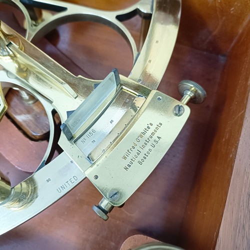 773 - A sextant, engraved Wilfred O'Whites Nautical Instruments, Boston USA in an oak case