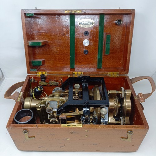 775 - A theodolite, cased, with a tripod (2)