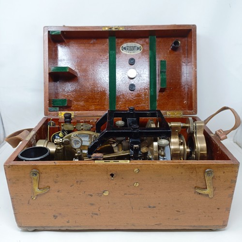 775 - A theodolite, cased, with a tripod (2)