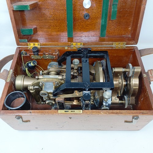 775 - A theodolite, cased, with a tripod (2)