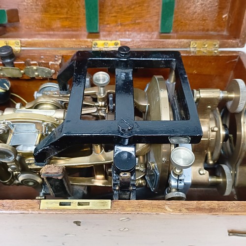 775 - A theodolite, cased, with a tripod (2)