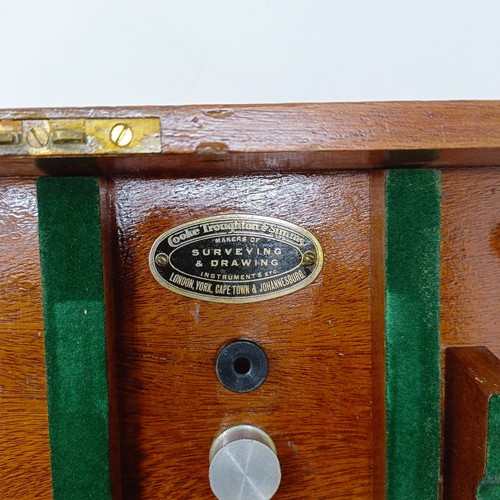 775 - A theodolite, cased, with a tripod (2)