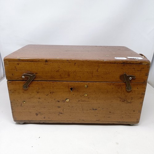 775 - A theodolite, cased, with a tripod (2)