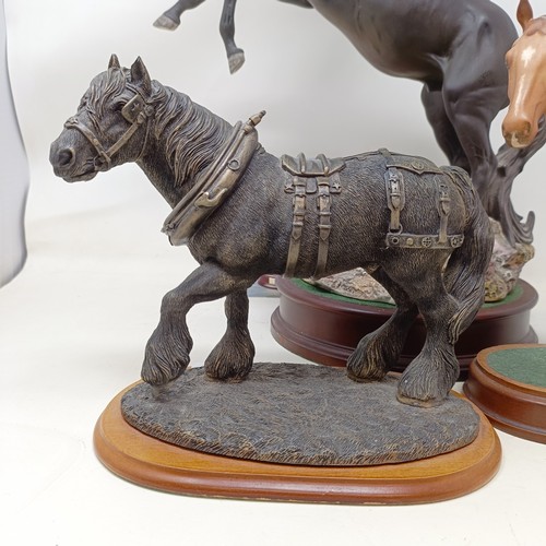 607A - A Beswick figure, Cancara The Black Horse, 40 cm high, a Doulton horse and a figure of a horse (3)