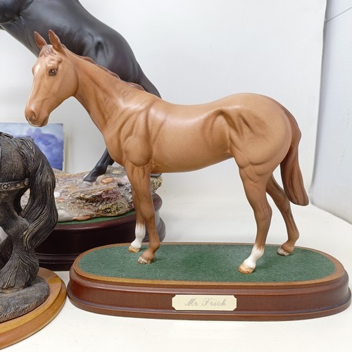 607A - A Beswick figure, Cancara The Black Horse, 40 cm high, a Doulton horse and a figure of a horse (3)