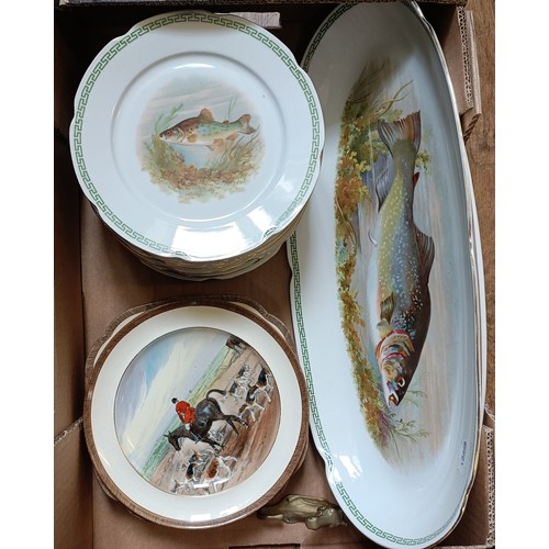 301 - A dessert service, decorated fish, a pair of prattware plates, decorated hunting scene and a novelty... 