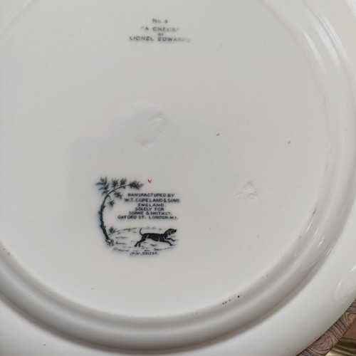 301 - A dessert service, decorated fish, a pair of prattware plates, decorated hunting scene and a novelty... 