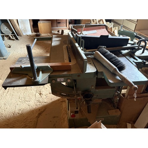 92 - A saw bench, and a dust extractor