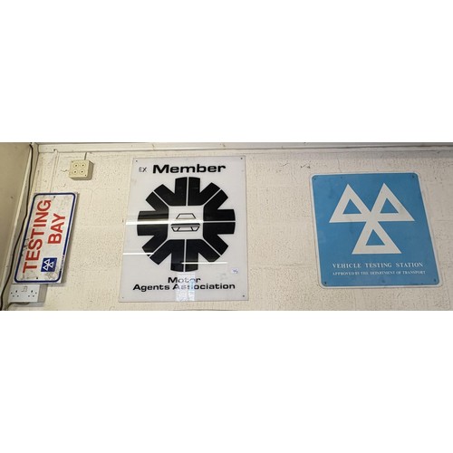 126 - An (Ex-)Member of the Motor Agents Association sign, a Vehicle Testing Station sign, and a small Tes... 