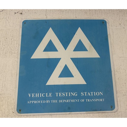 126 - An (Ex-)Member of the Motor Agents Association sign, a Vehicle Testing Station sign, and a small Tes... 
