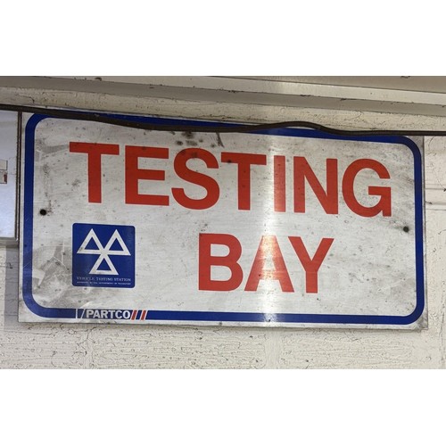 126 - An (Ex-)Member of the Motor Agents Association sign, a Vehicle Testing Station sign, and a small Tes... 