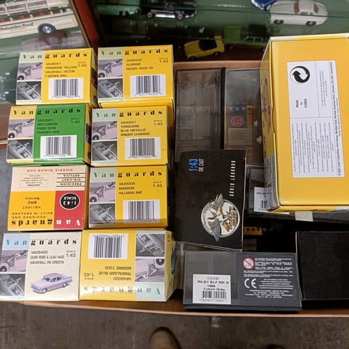 153 - Two wall mounted cases of die cast model vehicles, each cabinet 56.5 cm wide, and a group of boxes f... 